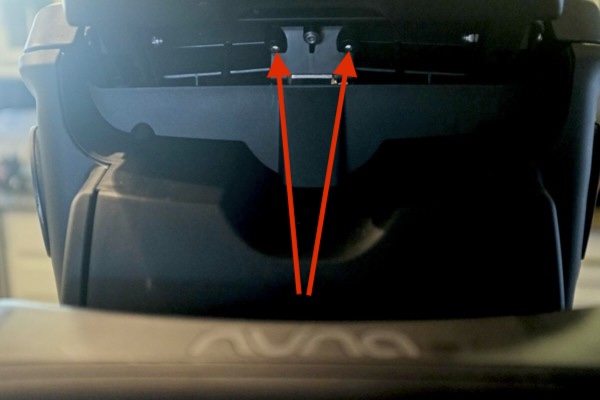 Loosen the two screws under the foot rest